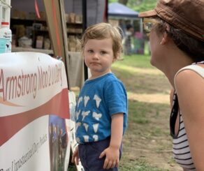 Kid at Farmer's Market