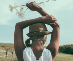 Girl holding flowers